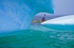 Beautiful curves of smooth blue ice, an element of an iceberg sculpted by the currents of the Atlantic Ocean and forces of nature such as wind and rain. A unique kayaking adventure though a very dangerous one off the coast of Newfoundland.