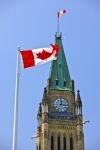 Photo: Canadian Flag In Front Of Peace Tower