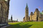 Photo: Centre Block Peace Tower of Parliament Buildings flanked by East West Blocks Parliament Hill