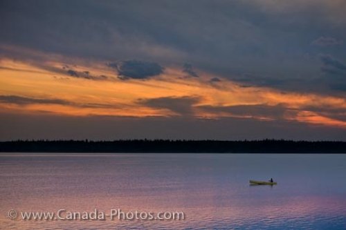 Photo: Sunset Canoeist Lake Audy Riding Mountain National Park