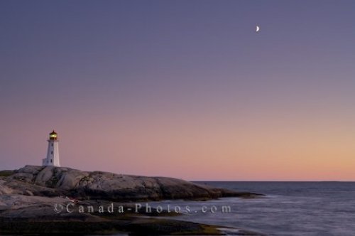 Photo: Sunset Moon Peggys Cove Lighthouse Nova Scotia Canada