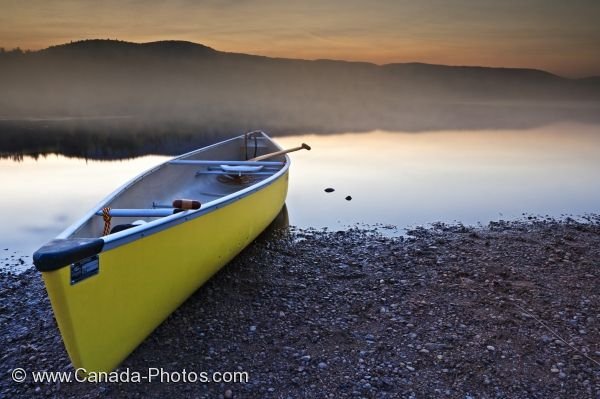 Photo: Lac Monroe Canoe At Sunset Parc National Du Mont Tremblant Quebec